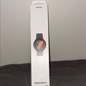 Samsung Galaxy Watch7 - Black with Orange Accent